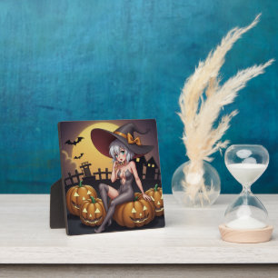 Grüne Halloween-Hexe auf dem Kürbis Fotoplatte