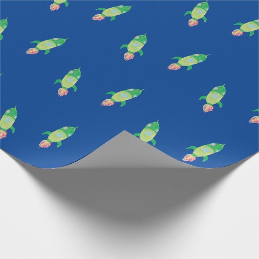 Grüne Kinderrakete Geschenkpapier (Ecke)