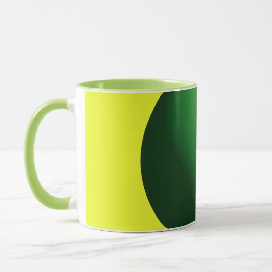Grüne Kugel auf Gelb Tasse (Links)