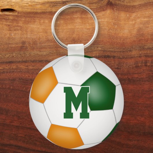 grüne Orangenfußball-Mannschaft gibt Mädchen Junge Schlüsselanhänger (Rückseite)