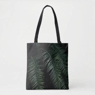 GRÜNE PALM-PFLANZE WÄHREND DER NACHT TASCHE