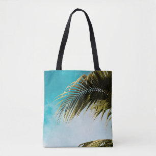 Grüne Palme unter blauem Himmel Tasche