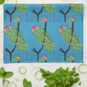 Grüne Papageien auf blauem Küchentuch (Gefaltet)