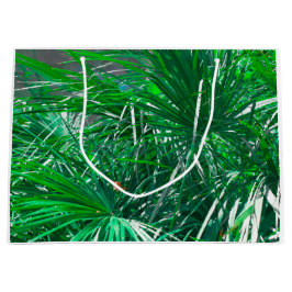 Grüne Pflanze aus Palmen Blätter pastellfarben Große Geschenktüte