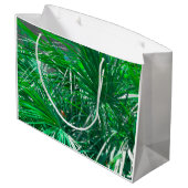 Grüne Pflanze aus Palmen Blätter pastellfarben Große Geschenktüte (Rückseite Schrägansicht)