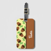 Grüne Pflanze aus Terrakotta auf gelb Gepäckanhänger (Vorderseite Vertikal)