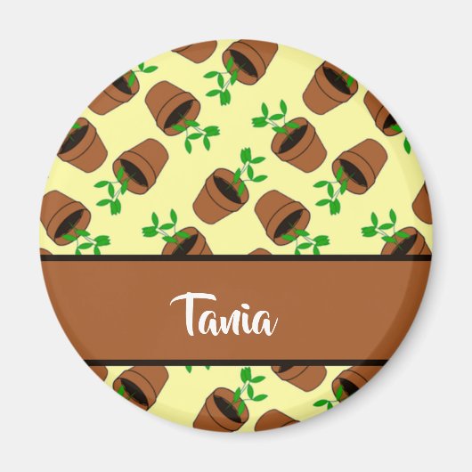 Grüne Pflanze aus Terrakotta auf gelb Magnet (Vorne)