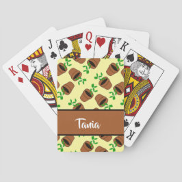 Grüne Pflanze aus Terrakotta auf gelb Spielkarten