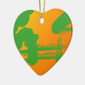 grüne Schmuckstücke in Orange Keramikornament (Links)