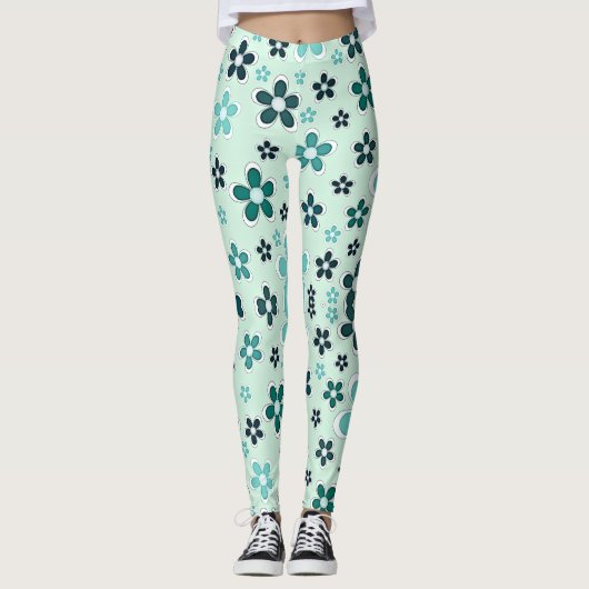 Grüne und blaue Blume auf hellgrünem Hintergrund Leggings (Vorderseite)