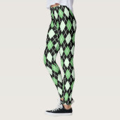 Grüne und schwarze Leggings (Links)