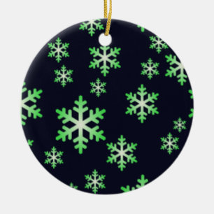 Grüne und weiße Schneeflocken mit blauem Hintergru Keramikornament