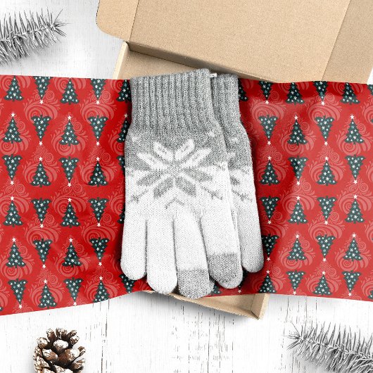 Grüne Weihnachtsbäume auf dem Roten Swirl Seidenpapier