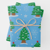 Grüne Weihnachtsbäume mit fallendem Schnee auf bla Geschenkpapier Set (Beispiel)