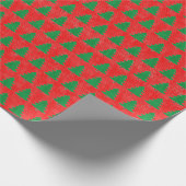 Grüne Weihnachtsbaummuster auf rotem Hintergrund Geschenkpapier (Ecke)