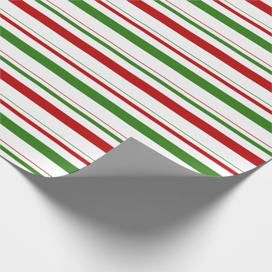 Grüne, weiße, rot-farbene Weihnachtsstreifen Geschenkpapier (Ecke)