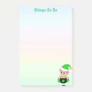 Grüner Elf & goldene Münzen auf pastellfarbenen To Post-it Klebezettel