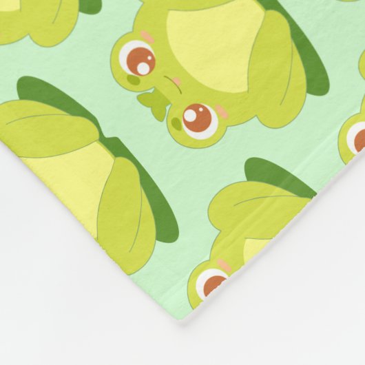 Grüner Frosch auf der Blätter Fleecedecke (Ecke)