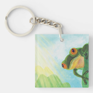 Grüner Frosch, der Sonnenstrahlen fängt Schlüsselanhänger