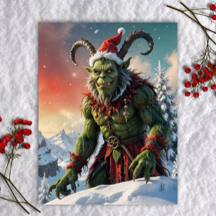 Grüner Krampus auf schneebedecktem Berggipfel Weih Feiertagspostkarte