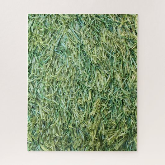 Grüner Kunststoff- oder Fake-Grashintergrund Puzzle (Vertikal)