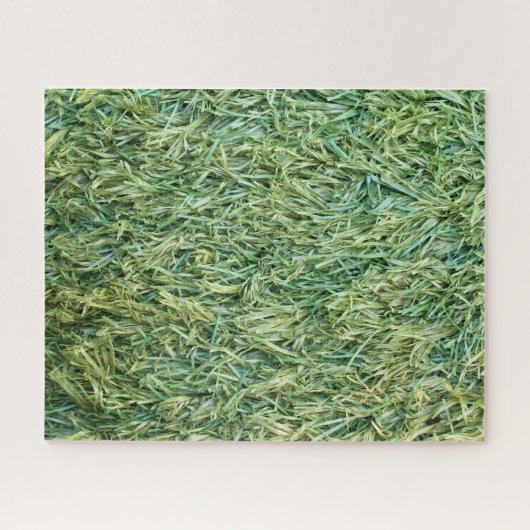 Grüner Kunststoff- oder Fake-Grashintergrund Puzzle (Horizontal)