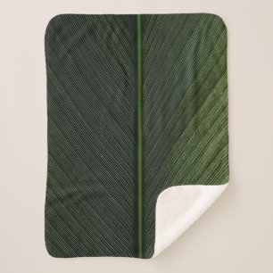 Grüner Metallstab auf schwarz-weiß pinstrix texti Sherpadecke