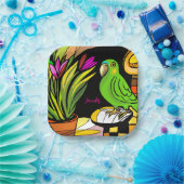 Grüner Papagei mit orangefarbenen und gelben Pappteller (Party)