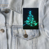Grüner Schimmer der Sterne auf dunklem Weihnachtsb Button (Insitu)