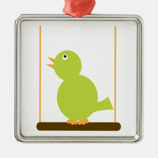 Grüner Vogel auf einem Perchornament Ornament Aus Metall