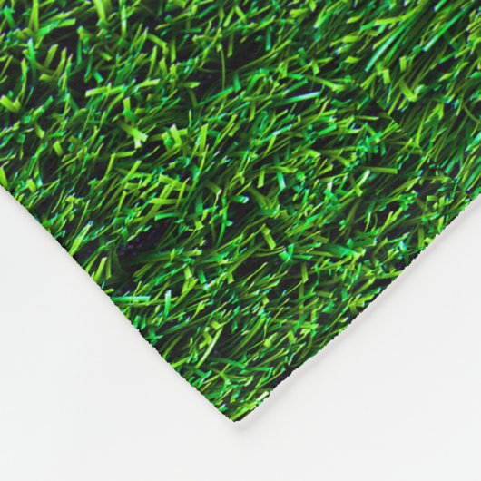 Grünes Gras-Hintergrund Fleecedecke (Ecke)