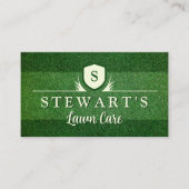 Grünes Grasrasen und Wappen für das Landschaftsbil Visitenkarte (Vorderseite)