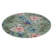 Grünes Hintergrund Blumenmuster. Schneidebrett (Ecke)