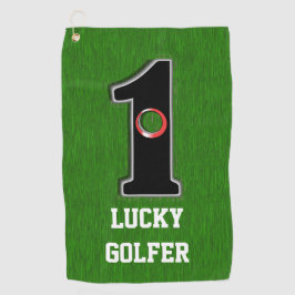 Grünes Loch in einem glücklichen Golfer mit Text Golfhandtuch