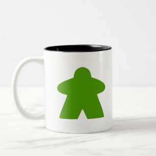 Grünes Meeple-Brettspielteil Zweifarbige Tasse