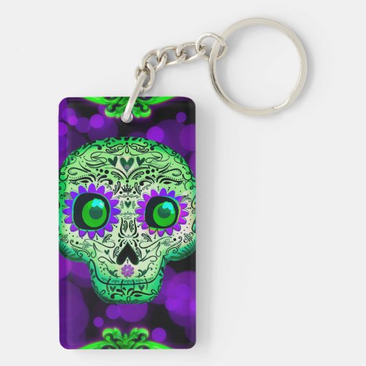Grünes und Lila glühendes Zuckerschädel Halloween Schlüsselanhänger (Rückseite)