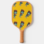 Grünes Zombie-Kind in Orange Pickleball Schläger (Rückseite)
