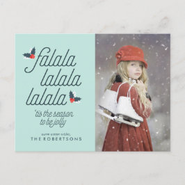 Grünflächen des Weihnachtsfeiertages im Foto Holly Feiertagspostkarte