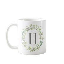 Grünkranz und Monogramm