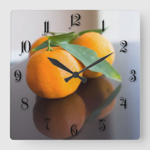 Gruppe der frischen Mandarinen Quadratische Wanduhr