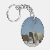 Gruppe Miniaturpferde im Schnee Schlüsselanhänger (Vorderseite links)