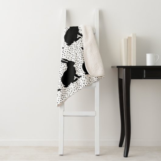 Gruppe sitzender Hasen mit schwarzer Silhouette Sherpadecke (Beispiel)