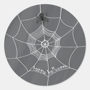 Gruseliche Spinne, die ein Happy Halloween-Netz sp Runder Aufkleber