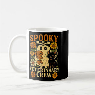 Gruseliger Geist hält schwarze Katze Hund Tierarzt Kaffeetasse