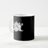 Gruseliger Kaffee schlürfender Kürbis haltend Kaffeetasse (Vorderseite Links)