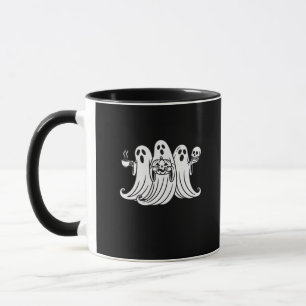 Gruseliger Kaffee schlürfender Kürbis haltend Tasse