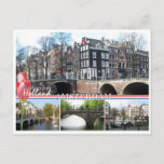 Grüße aus Holland - Amsterdam Postcard Postkarte<br><div class="desc">Grüße aus Holland - Amsterdam Postcard. Eine Postkarte aus dem Amsterdamer Stadtbild mit wunderschönen Fotos der Amsterdamer Kanäle, Häusern und Brücken und dem Text "Grüße aus Holland" mit rosa Tulpen, der niederländischen Nationalflagge und dem Text "Amsterdam". Diese großartige Amsterdamer Karte ist vollständig anpassbar, fügen Sie Ihre Texte und Bilder! Ein...</div>