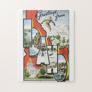 Grüße Reise-Plakat-Grafik Idahos von der Vintagen Puzzle