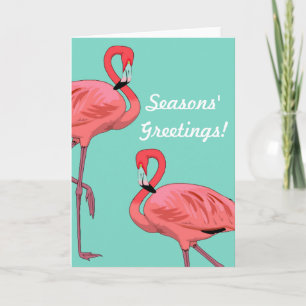 Grüße zur Weihnachtszeit mit rosa Flamingos Feiertagskarte