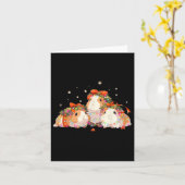 Guinea Schweine in der Guinea Weihnachtslicht vers Karte (Gelbe Blume)